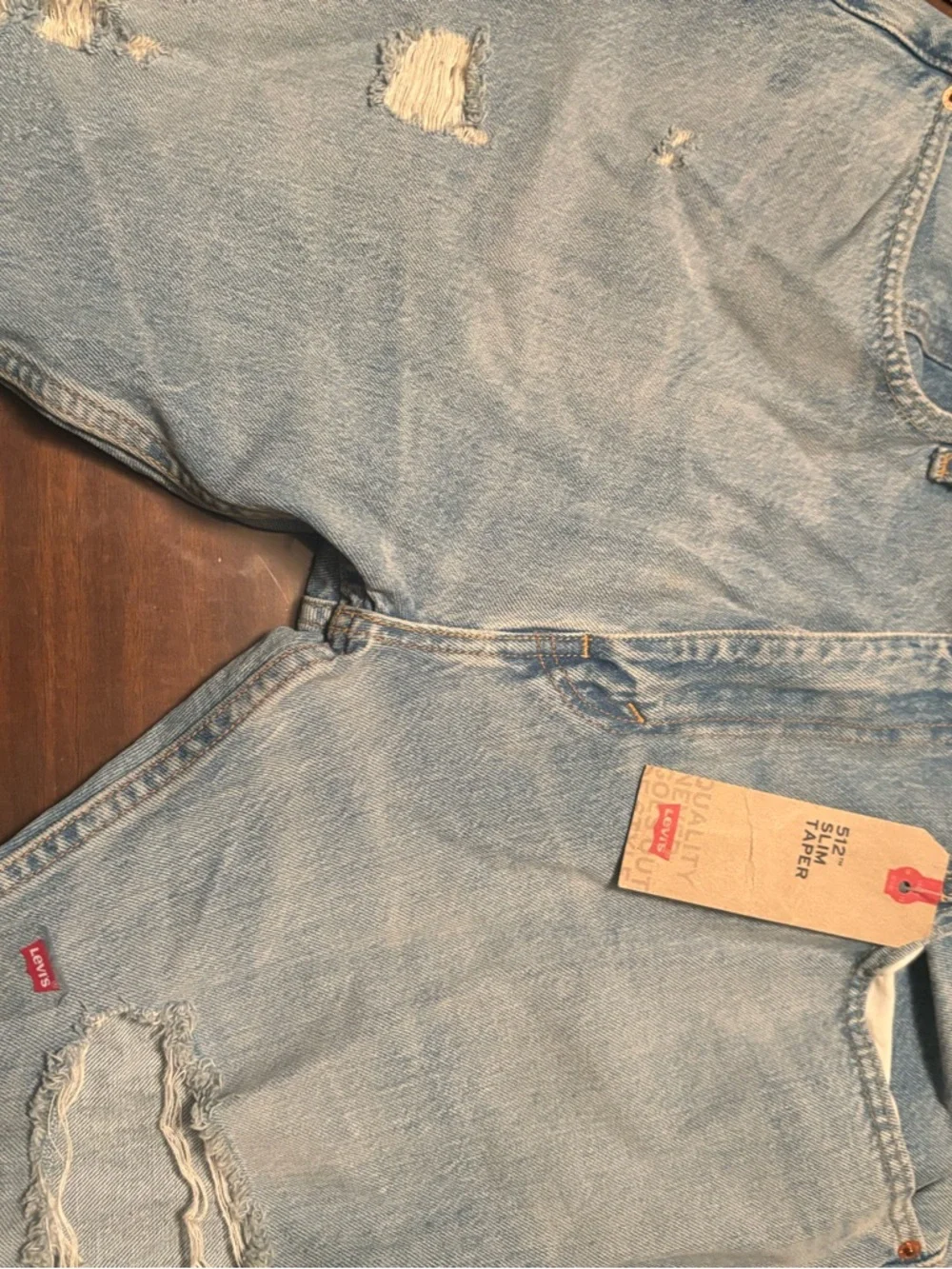 Levi's Light Blue Denim Jeans with Tan Patch